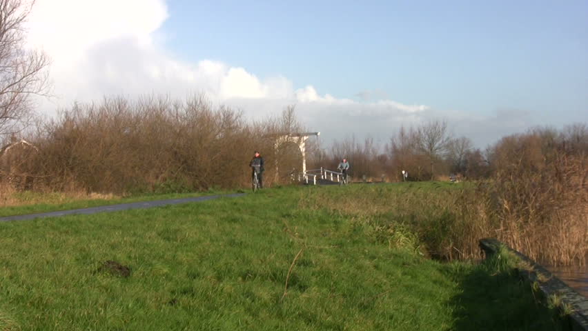 Man on bicycle in nature preserve