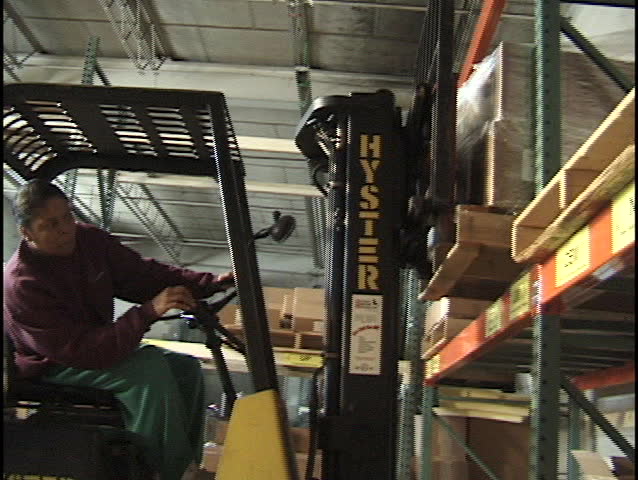 forklift operator placing skid 2