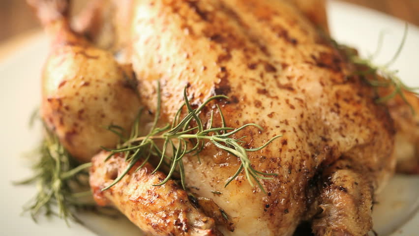 close up of roasted chicken moving from left to right
