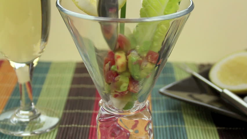 Making a sumptuous prawn cocktail to enjoy for lunch. 