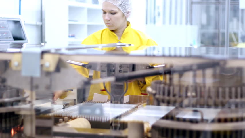 Automatic filling machine for the production of medicines in ampules.  HD 1080p.