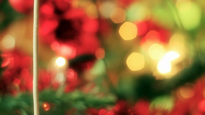 Christmas background with Two burning sparklers