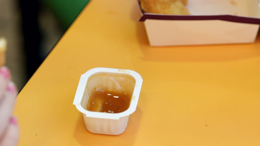 Dipping Fries and Nuggets into sauce