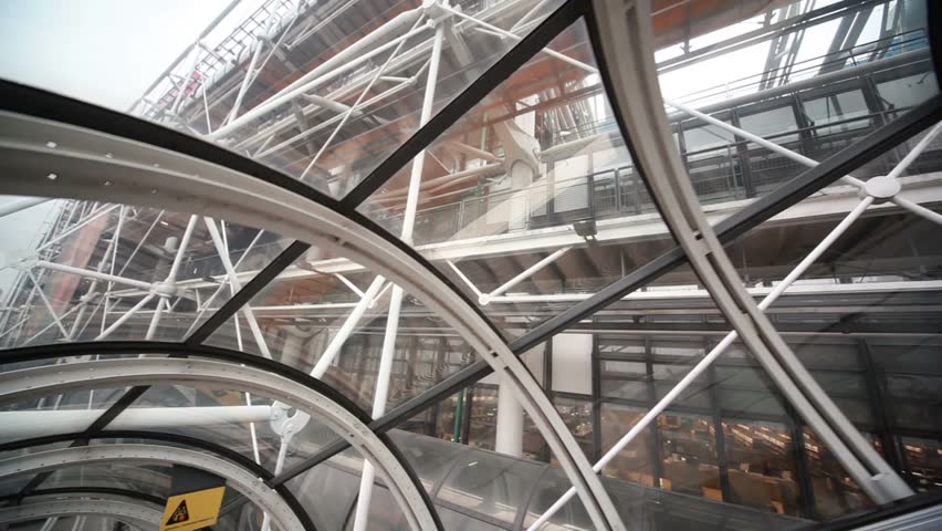 elevator lift up, backdrop building with wall of glass