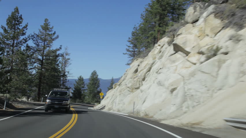 Driving POV on Nevada State Highway 28, along the east shore of Lake Tahoe (called one of the most beautiful drives in the US).