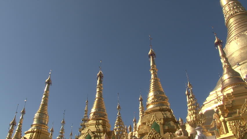 Interior of the biggest Buddhist temple Schwedagon pagoda, Rangoon, Burma. Dayview, panning right.
