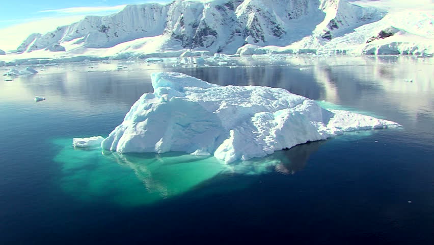 iceberg in full sunshine in antarctica