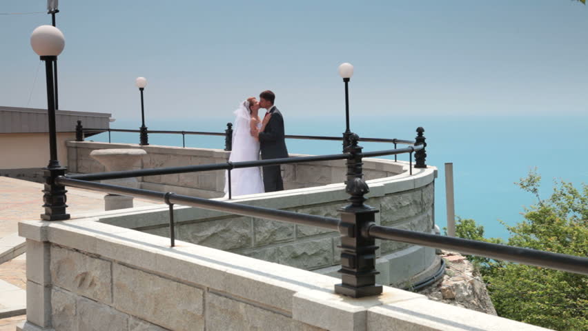 bride and groom on the terrace in Foros, Crimea, Ukraine