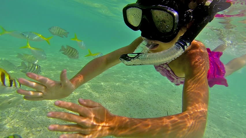 Scuba Diver Rescuing Girl Drowning In Coral Reef Stock Footage Video