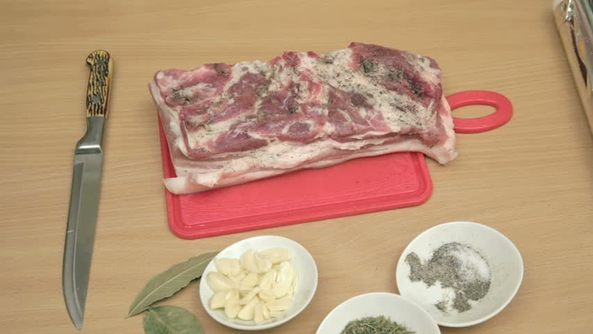 Young woman's hands prepare flavorful and nutritious meal. Salted and pepper 