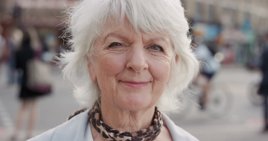 Slow Motion Portrait Of Happy Mature Old Woman Smiling In