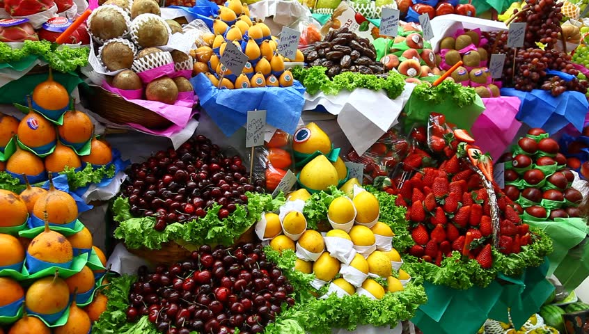 SAO PAULO, BRAZIL - JUNE 22: Fruit for sale in Mercado Municipal de SÃÂ£o Paulo on June 22, 2011. Opened in 1933, Mercado Municipal de SÃÂ£o Paulo is an important trading wholesale and retail establishment and is located in the historic center of SÃÂ£o Paulo