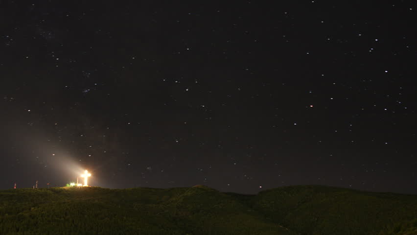 Millennium Cross at night with stars time lapse long exposure Full HD
