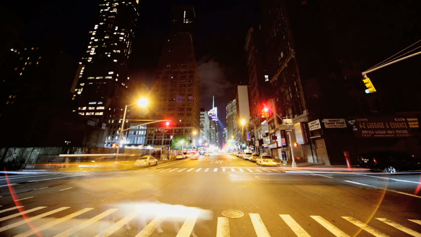 NEW YORK - MAY 7: (Timelapse View) Cabs and traffic driving down a busy avenue May 7, 2011 New York, NY