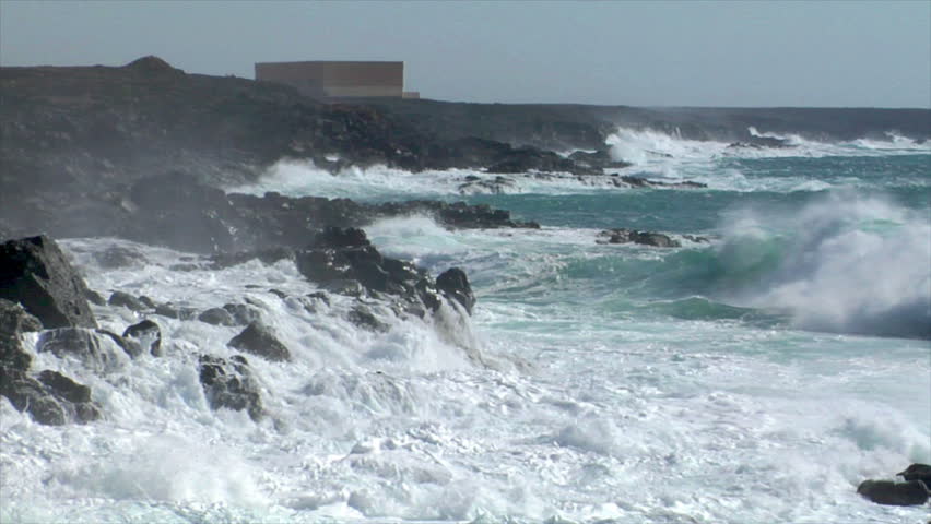 extreme wave crushing vulcan coast