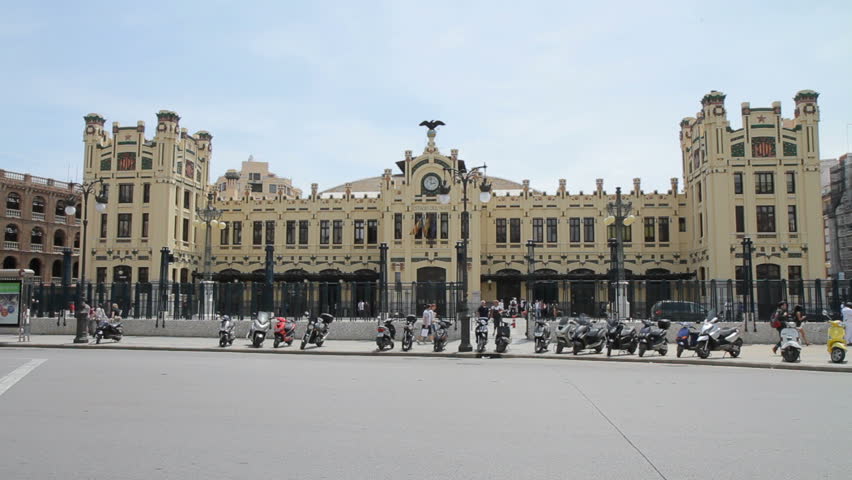 Valencia, Spain - Estacion del Norte (North Station), an important train station of the city. The 1917 modernist building is also a landmark sight. The clock shows 3 pm  (June 2011, 1080p).