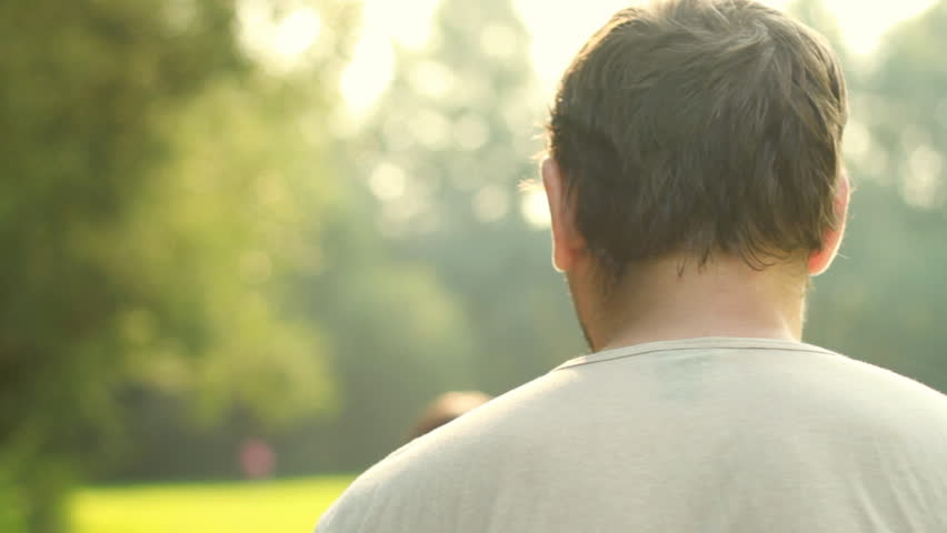 Woman hugs and kiss man, outdoors