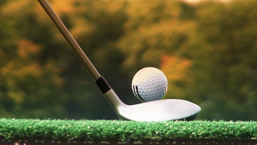 closeup of golf ball and swing