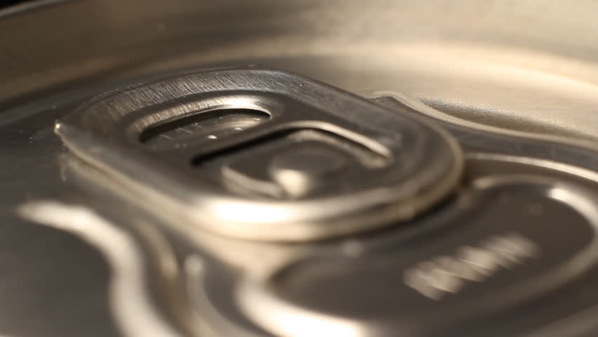 Close up of soda or beer can opening theme sound of opening cans