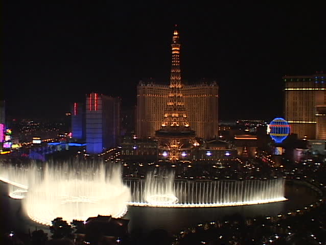 LAS VEGAS, NV - CIRCA 2010: Fountains shoot water into the Las Vegas sky near the Paris Hotel and Casino circa 2010 in Las Vegas, NV.