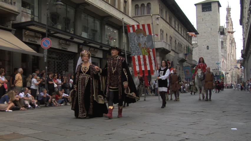 COMO, ITALY - CIRCA SEPT 2011:  Palio del Baradello re-enacts Barbarossa's visit to his allies in Como after defeating Milan in the 1159 battle, circa Sept 2011, Como, Italy. Period dances, games and shows create a medieval atmosphere at this annual event