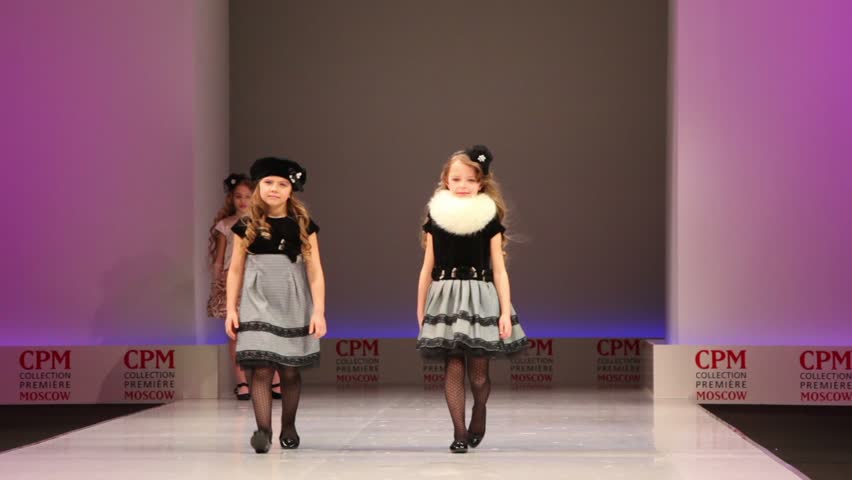 MOSCOW - FEBRUARY 22: Two girls in wear from Snowimage on catwalk in CPM, on February 22, 2011 in Moscow, Russia.
