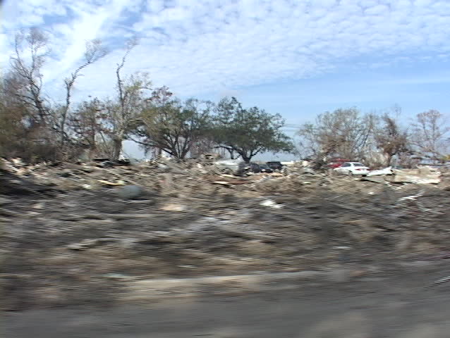 Cars and debris strewn all over show the destruction caused by Hurricane Katrina.