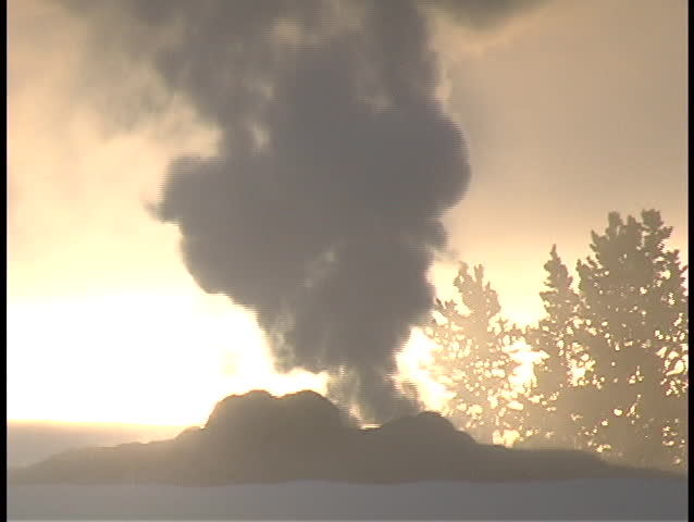 Smoke spews from a geothermal feature  in Yellowstone National Park.