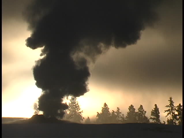 Smoke spews from a geothermal feature in Yellowstone National Park.