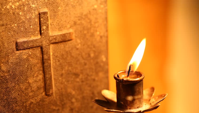 Holy cross with Candle