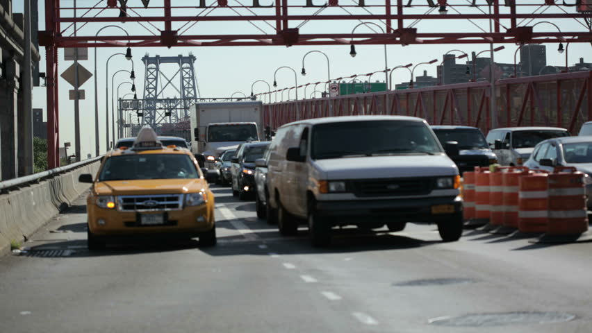 NEW YORK - OCT 6: (Timelapse View)  Vehicle traffic on the Manhattan side of the Williamsburg bridge. October 6th 2011 in New York. 