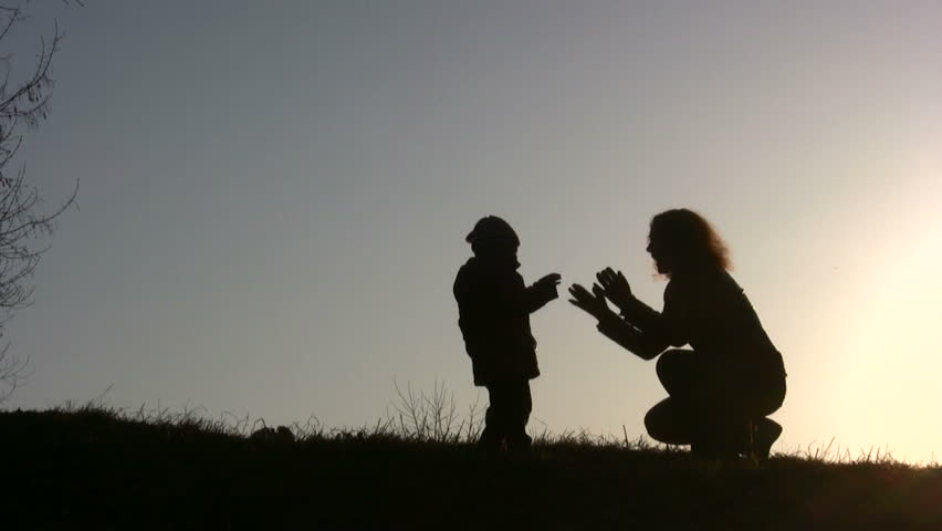 mother baby play sunset