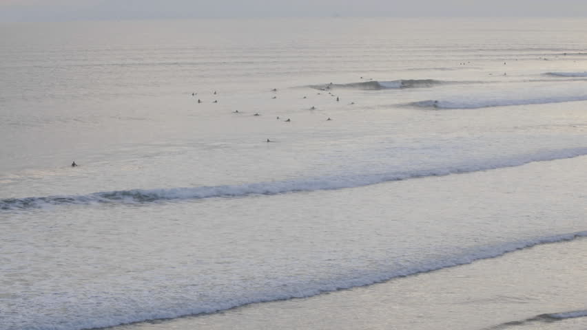 Time lapse of surfers catching set waves at Ventura Point in Ventura, California.