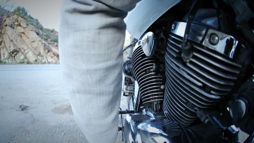 Motorcycle driven down mountain highway