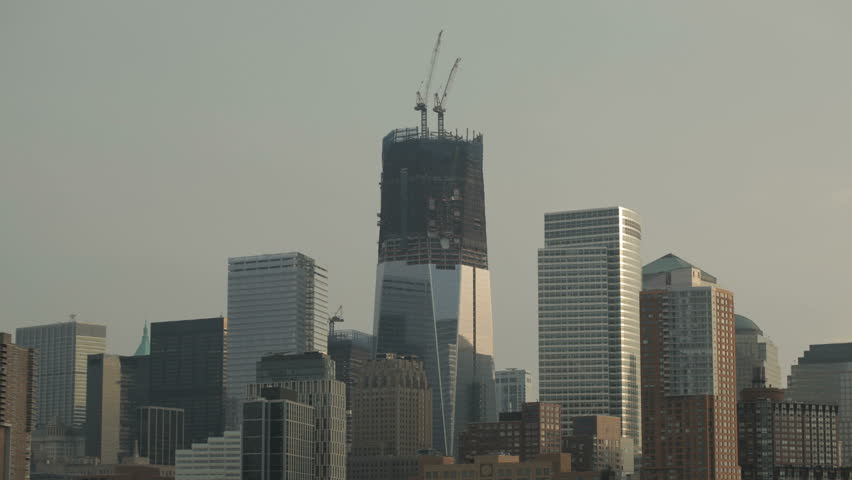 time-lapse cranes moving steel girders etc during construction at One World Trade center site in lower Manhattan NYC.Taken October 24th 2011.