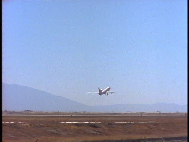 SALT LAKE CITY, UT - CIRCA 1997: A passenger plane takes off from an airport circa 1997 in Salt Lake, UT.