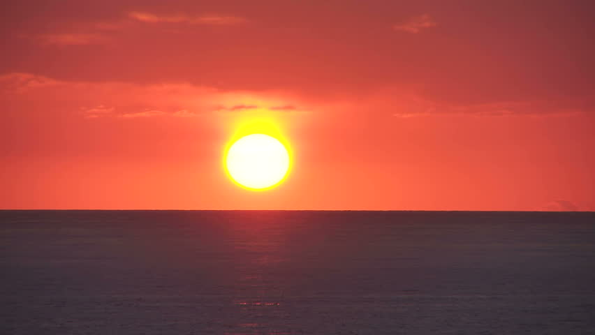 Sunset on the sea horizon