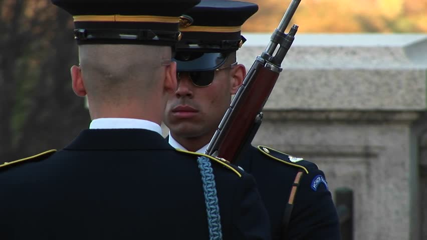 soldiers follow orders as they guard the tomb of the unknown soldier.