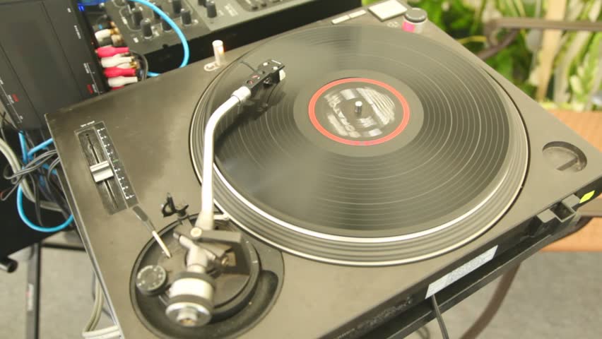 player of vinyl records twists plate and music sounds