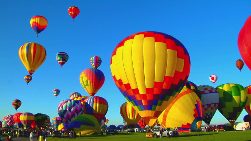 Colorful balloons launch at the Albuquerque Balloon Festival