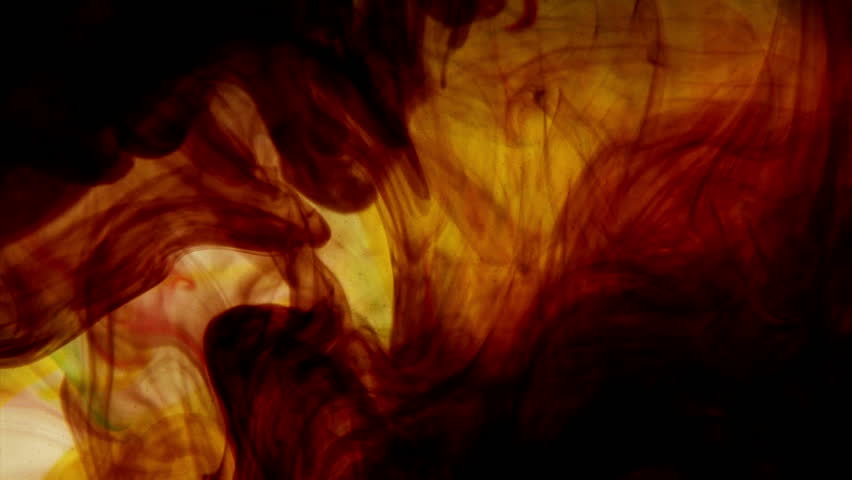 Colored ink dropped into water. Tobacco color. 