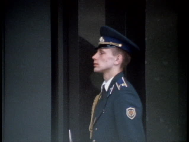 MOSCOW - CIRCA 1970: An archival shot of soldiers marching in front of Lenin's Tomb in Moscow, Russia circa 1970