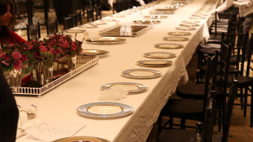 Elegant candlelight dinner table setting at reception