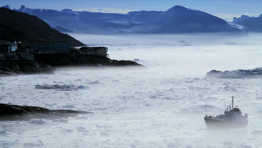 Boat in Freezing Mist Surrounded by Ice Floes