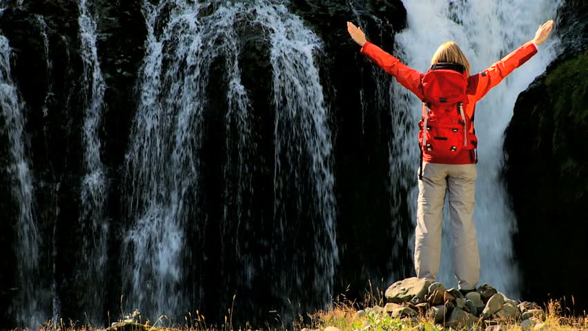 Female Hiker Celebrating Expedition Success