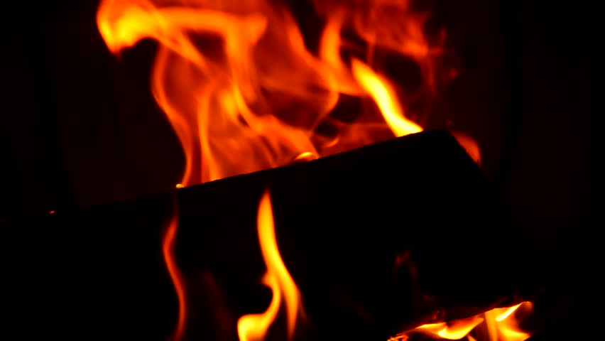 Burning flames in the fireplace