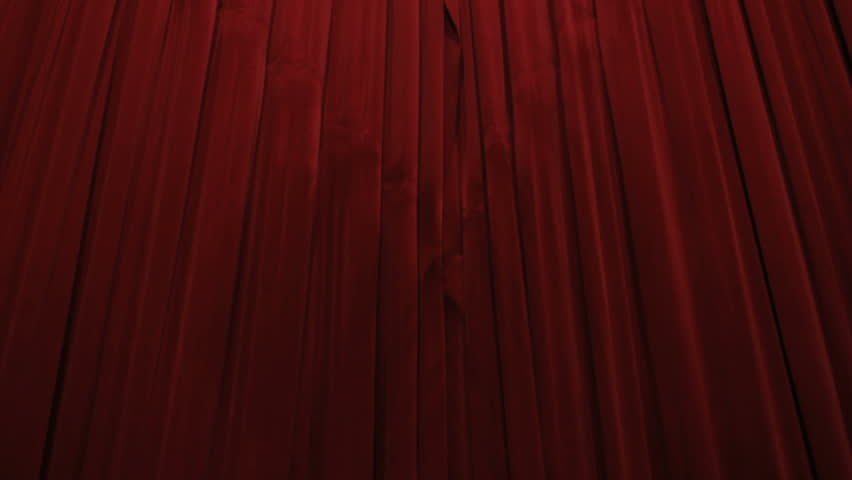 opening real red curtains