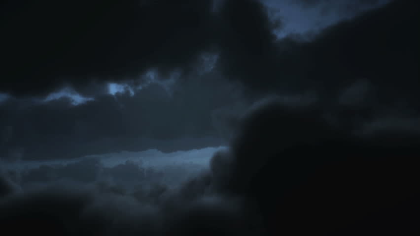 At night flying through lightning and thunderstorm 