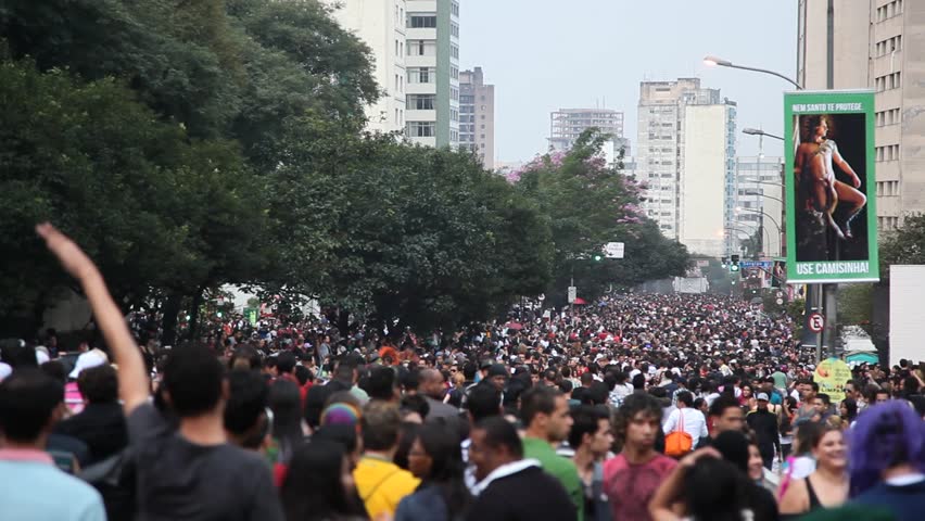 SAN PAULO, BRAZIL - CIRCA JUNE 2011: Crowds celebrate the LGBT Gay Pride Parade on Avenida Paulista circa June 2011 in San Paulo.