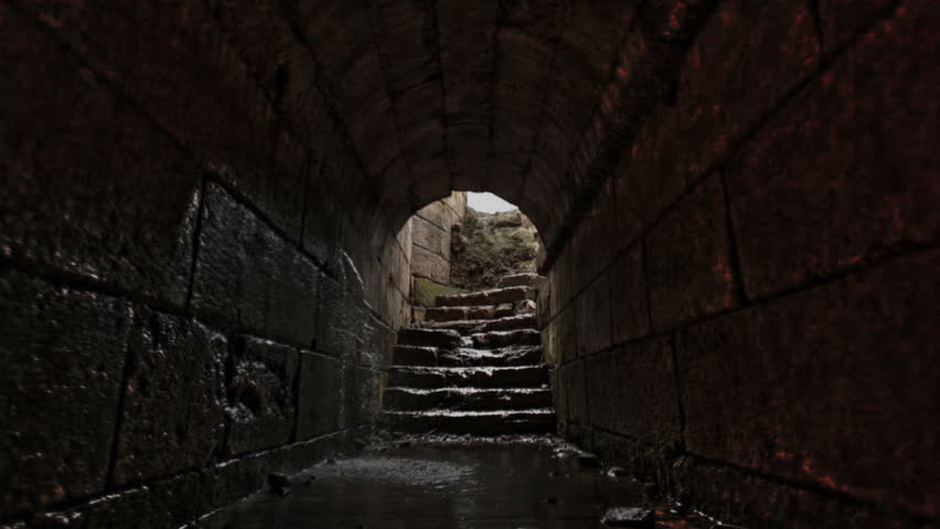 Slider dolly move at floor level in the underground tunnel at the palace of Agrippa in Banias, Israel